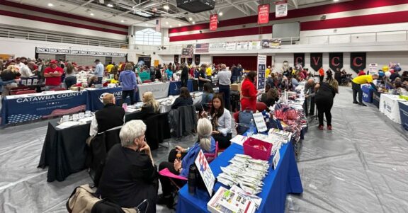 Foothills Veterans Helping Veterans event inside arena venue vender booths attendees