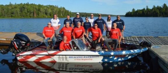 Healing Patriots team with their boat