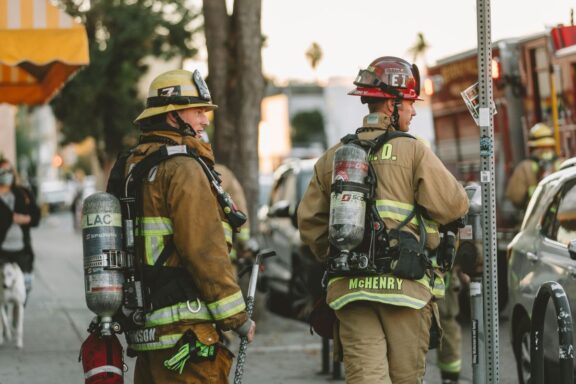 LA firefighters observing the scene on community business street courtesy of spencer davis qY_bW8b7iG8 unsplash