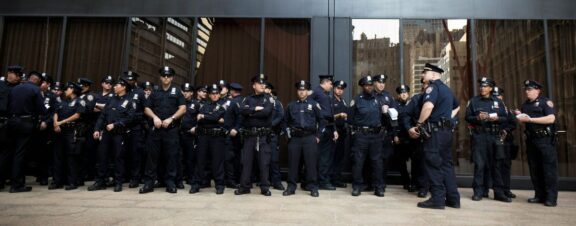 New York police department officers in front of wall street felix-koutchinski-WEcl8_kqwpg-unsplash