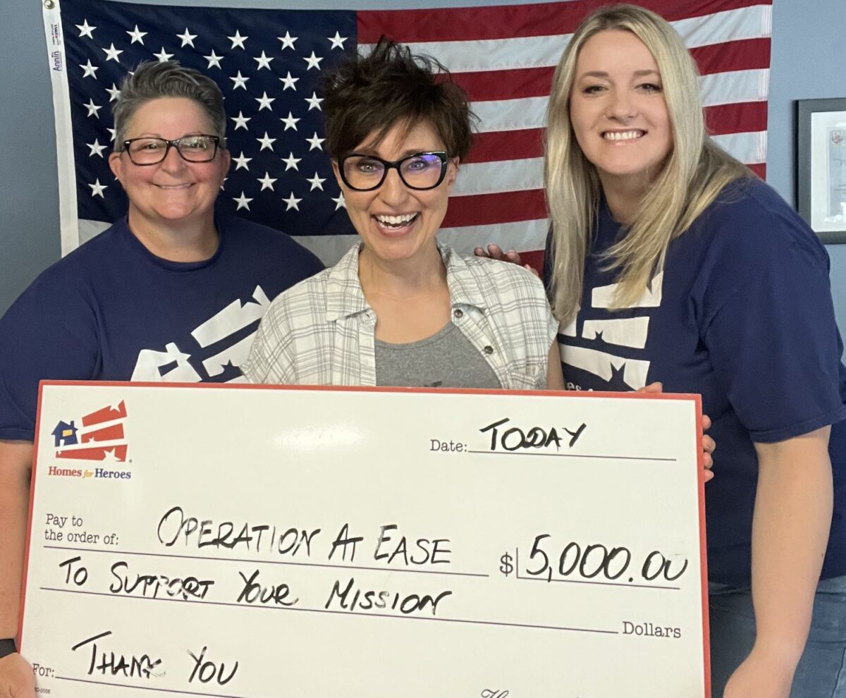 Operation At Ease big check 5000 grant presentation with Joni and Homes for Heroes specialists